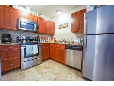 Kitchen with decorative backsplash, stone finish 