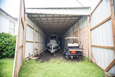 And a boat barn that holds 2 23' boats and a golf