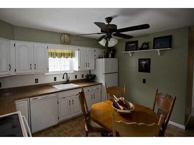 Kitchen. Crisp clean cabinets are accented by oile