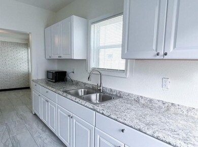 Front Unit: Plenty of cabinets in this kitchen
