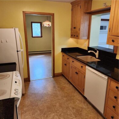 Kitchen is the center of the home. Off to this sid