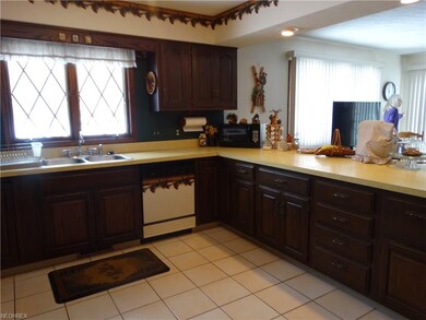 11X12 kitchen with ceramic tile flooring