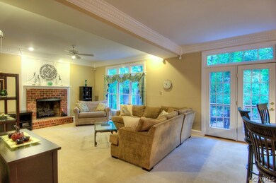 Family Room with gas fireplace.  Door leads to mul