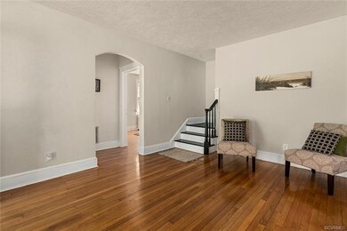 Pretty arched doorway leading from Living Room to 