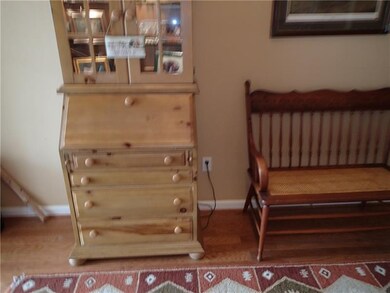 The entry can accommodate seating and furniture di
