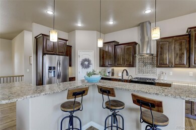 Raised counters for bar stool seating at kitchen i