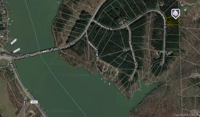 This wooded lot is just minutes away from Sashas At The Lake restauranct & boat slips and ramp and from the free public boat launch off of Long Island Road