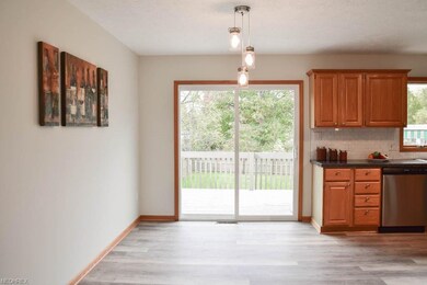 Dining room with a new sliding door to the upper d