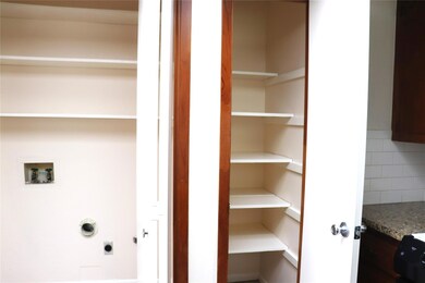 Laundry area with hookup for an electric dryer an