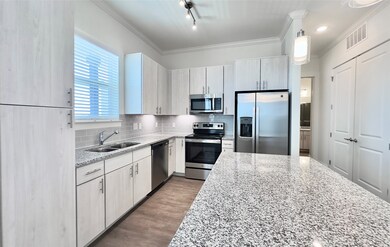Kitchen island with breakfast bar, granite counter