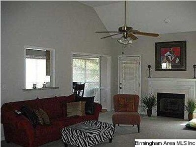 LARGE FAMILY ROOM WITH GAS LOG FIREPLACE.