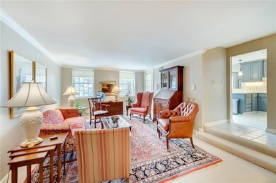 Spacious, bright living room.  View to kitchen & d