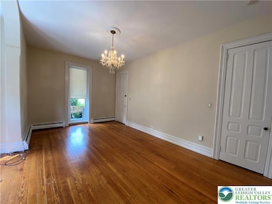 Beautiful hardwood floors, crystal chandier