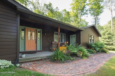 Front porch with brick walkway