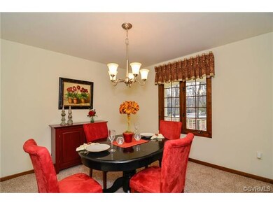 Formal dining room just off of the kitchen, new ca