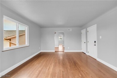 Spare room with wood-type flooring