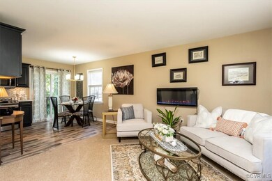 Living Room looking open to Kitchen with Eat in Kitchen area
