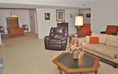 The great room leads to the separate dining room. 