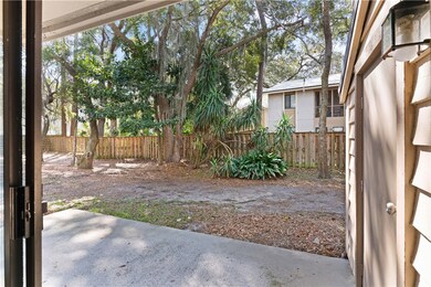 View of back from open sliding glass door