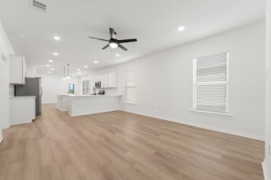This home offers a stunning view of its elegant de
