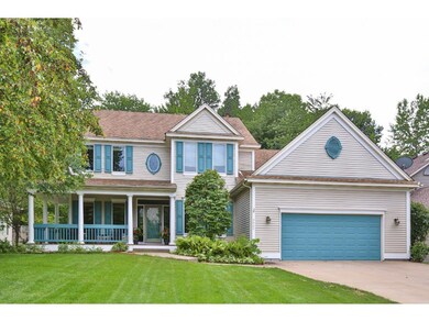 Charming curb appeal boasts a quaint front porch f
