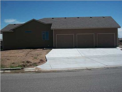 Full three car approach, 30x34 oversized garage.