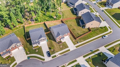 Elevated view of the home located on a low-traffic cul-de-sac. Just a short walk to the vibrant community amenities.