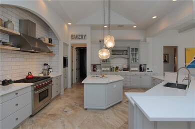 Kitchen With Wolf Six Burner Gas Range