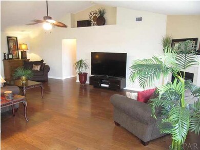 HARDWOOD floors continue in all 4 bedrooms, great room, living room & office.