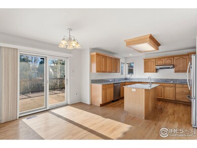 Kitchen view to east-facing backyard and sunrise deck