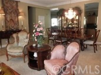 Entry with Adjoining Living and Dining Room