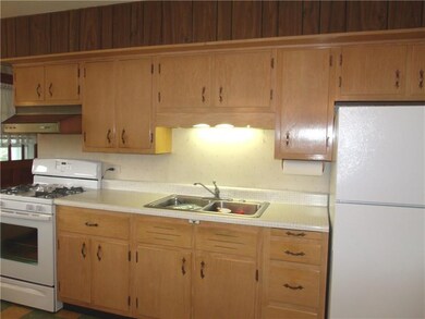 Large eat in kitchen offering plenty of cabinets a