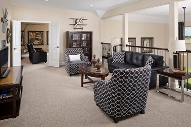 **Home is Under Construction. The photo shown here is of a completed home that has the same floor plan and similar elevation. Options and color selections may vary.**