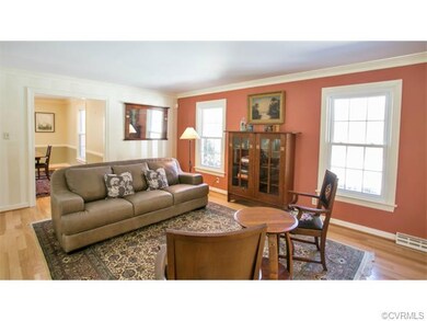 Formal living room between Foyer and Dining Room