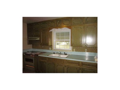Kitchen. Sturdy built cabinets hold lots of kitche