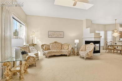 Flowing floorplan w/ 3-sided fireplace