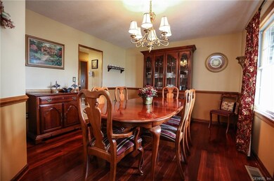 Newer hardwood floors, chair rail, and lighting ma