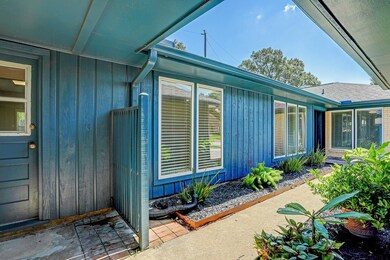 One of a kind quaint home nestled among the mature