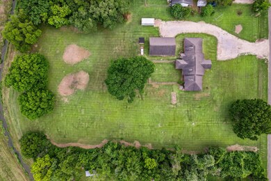 MUSTANG BAYOU SITS AT THE REAR OF THE PROPERTY OFF