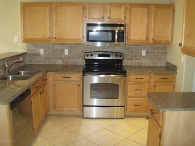 Kitchen with New Stainless Steel Applian