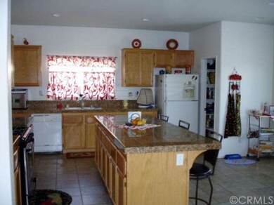 Kitchen with a walk-in panty on the right.