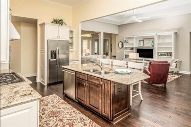 Open kitchen features natural gas cooking and GE M