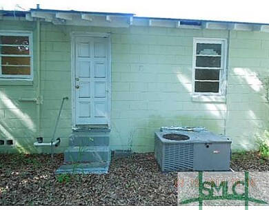 Exterior Back. Back showing back entry & HVAC unit