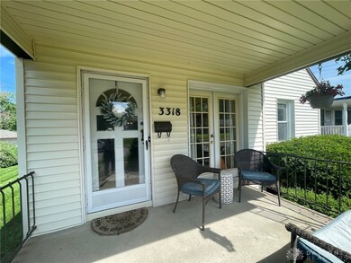 Look at this porch - some privacy but you can watch the neighbors stroll by, too.