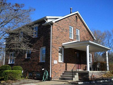 Exterior Front. Rear of home.  Side porch steps.