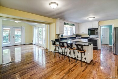 Eat-in Kitchen with Hardwood Floors, Granite Count