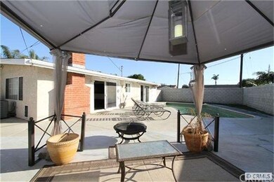 Backyard has a salt water pool and spa