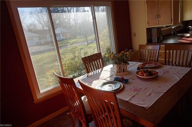 Dining room features large window and built in buf