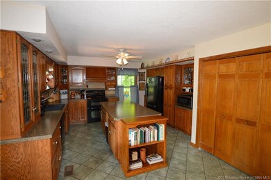 WOW what a tremendous kitchen. Plenty of cabinets,