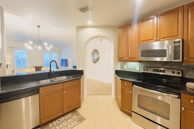 7505 Mourning Dove Cir unit 302, Reunion, FL 34747 - photo 2